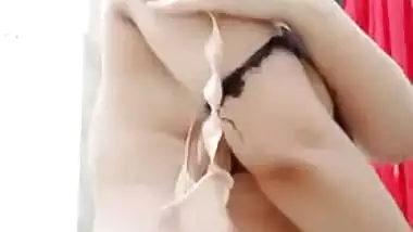 Selfie MMS clip of Desi girl with juicy tits performing XXX striptease