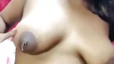 Bengali slut Lisa feeding boobs and foot fingering pussy