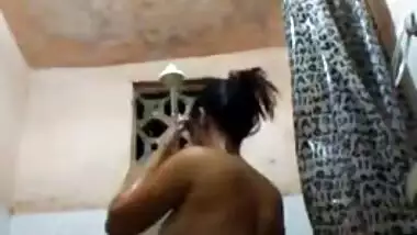 Nude Indian woman relaxes solo in the shower in amateur porn clip